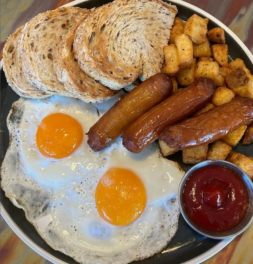 Eggs and sausage breakfast in Prairie's Edge restaurant in Winnipeg