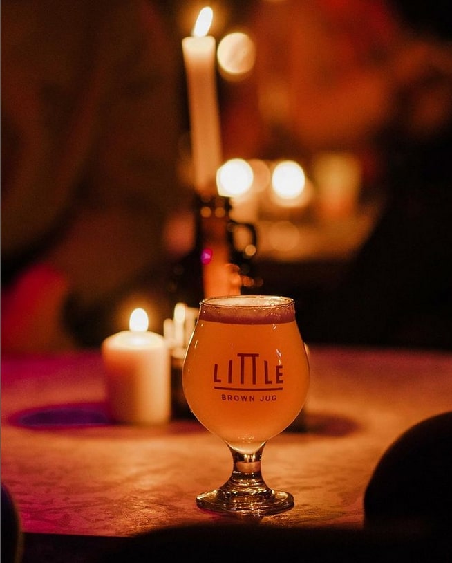 A photo of a glass of beer from Little Brown Jug in downtown Winnipeg